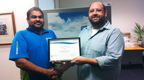 Pictured is Wellington Regional Director Andrew Alleway congratulating Ram on his achievement