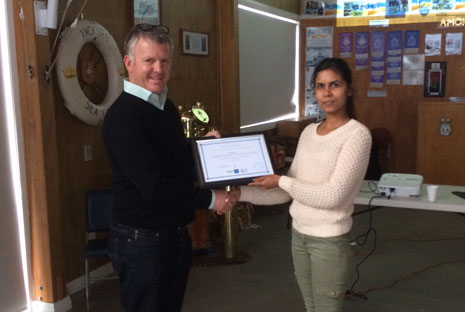 Wellington Franchisee Monita Devi-Chand receives her Five Year Long Service certificate from Managing Director Grant McLauchlan