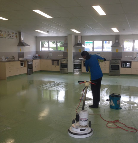 CrestClean franchisee Anuragni Chandra applying stripper during a Hard Floor Care Training Course. 