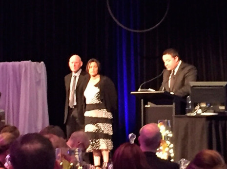 CrestClean Nelson was a finalist in the 2015 Westpac Nelson Tasman Chamber of Commerce Business Awards. Pictured on stage with MC Duncan Garner is Regional Manager Barbara de Vries and husband, Shane.