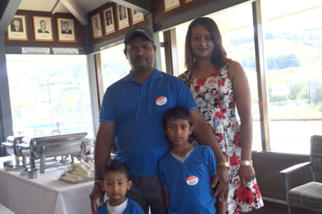 Dan and Madhu are pictured with their two sons Ryan and Tyler.
