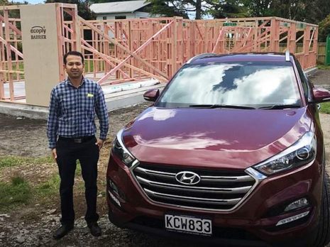 Prasun Acharya has a brand new car and is having a home built for his family.