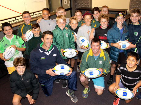 John Leslie (left) and Mike Williams, Mount Sports Junior Rugby chairman, with the under 12s team.