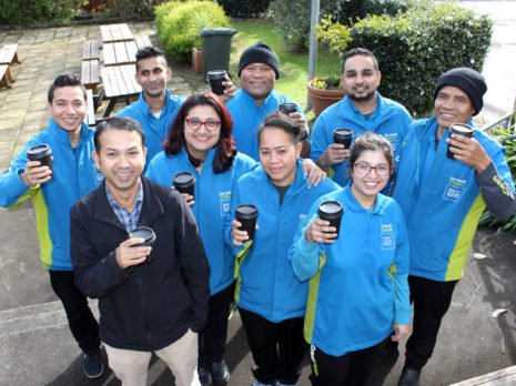 Taranaki Regional Manager Prasun Acharya with his team at one of their regular catch up meetings.