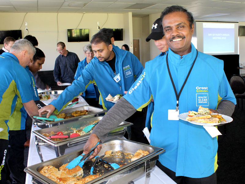 Lalith Degambada tucks into lunch at the recent CrestClean team meeting in Rotorua.