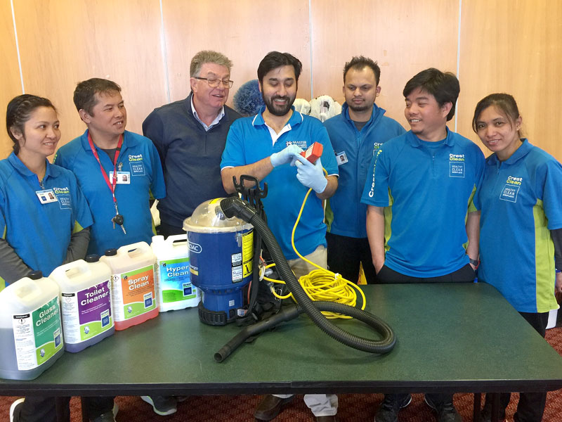 Ashneer Datt shows CrestClean personnel tips on the safe use of a vacuum cleaner. Looking on is Adam Hodge, CEO of the Master Cleaners Training Institute.