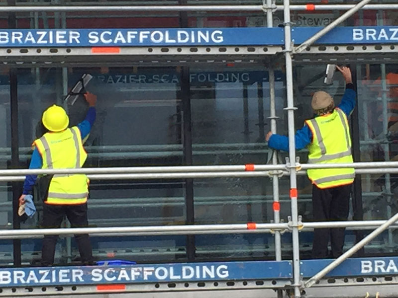 CrestClean personnel ensure the windows of Kmart’s new Invercargill store look sparkling.