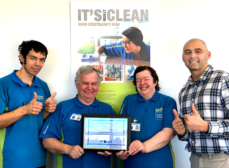 Steve Kannewischer with his wife Lynne and  stepson Sam Larkins are celebrating seven years with CrestClean. Also pictured is Tony Kramers, CrestClean's Dunedin Regional Manager.