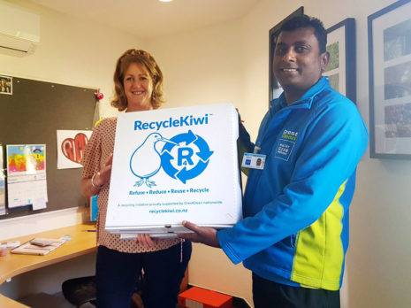 Naresh Mani presents a RecycleKiwi pack to Leanne Hanna, Principal's PA/Office Manager at Red Beach School.