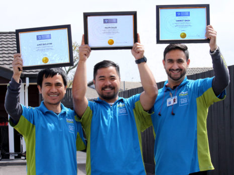 Junie Bag-Ayn, Ralph Sales and Tanmeet Singh with their certificates from Master Cleaners Training Institute.