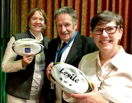 Glenn Cockroft presents CrestClean rugby balls to Sister Laurie Brink and Sister Betsy Pawlicki during their visit to Invercargill.