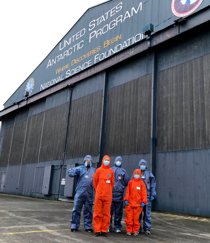 Cleaning team members assemble at the Christchurch base of the United States Antarctic Program.