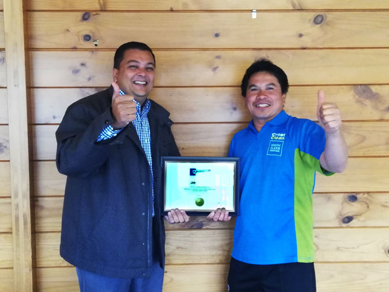 Jande Fuertes Ganas receives his award from Nivitesh Kumar, CrestClean’s Waikato Regional Manager.