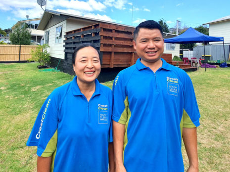 Thang Hlawnceu and his wife Van Par Hnem in the garden of their new home in the Auckland suburb of Massey.