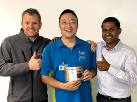 Sunny Yang receives his 10-year award from Sam Lewis (left), CrestClean’s General Manager Franchise Services, and CrestClean’s Christchurch North Regional Manager Yasa Panagoda.