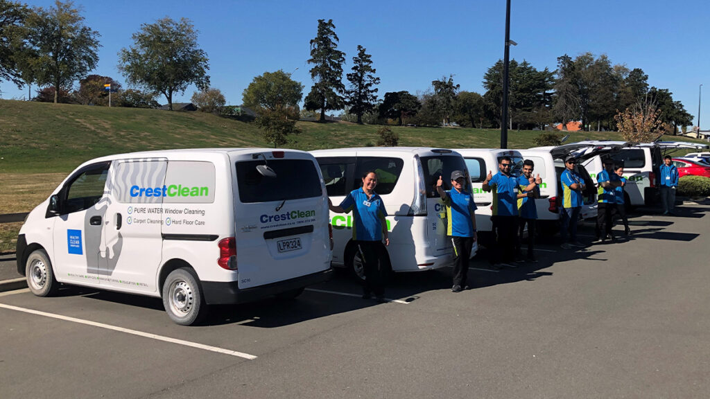 Cleaners by their van.