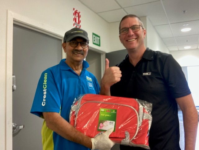 TVH Managing Director Brendan Chillngworth presents CrestClean’s Vijay Nand with a gift to celebrate his 15-year milestone.
