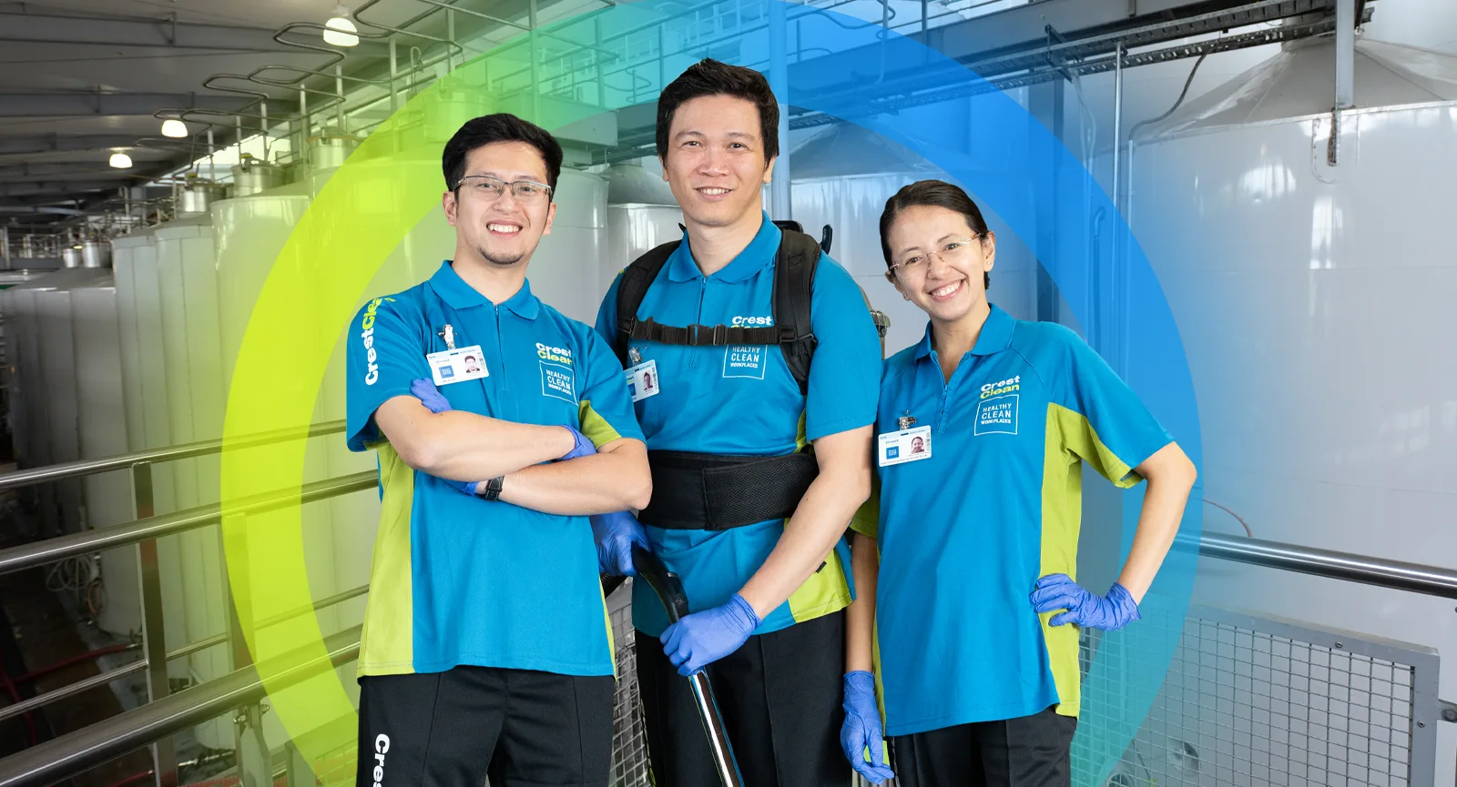 Team of 3 CrestClean franchisees standing in industrial premises